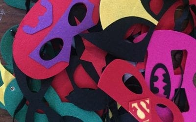 What is in a Dazzle Superhero Activity Pack?